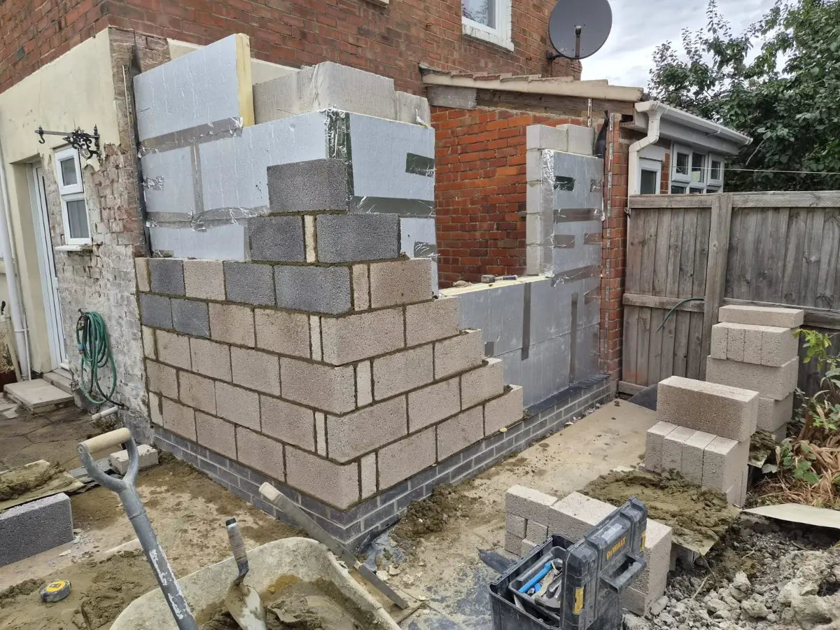 Cavity blockwork and facing brickwork going up on the Broadgreen extension