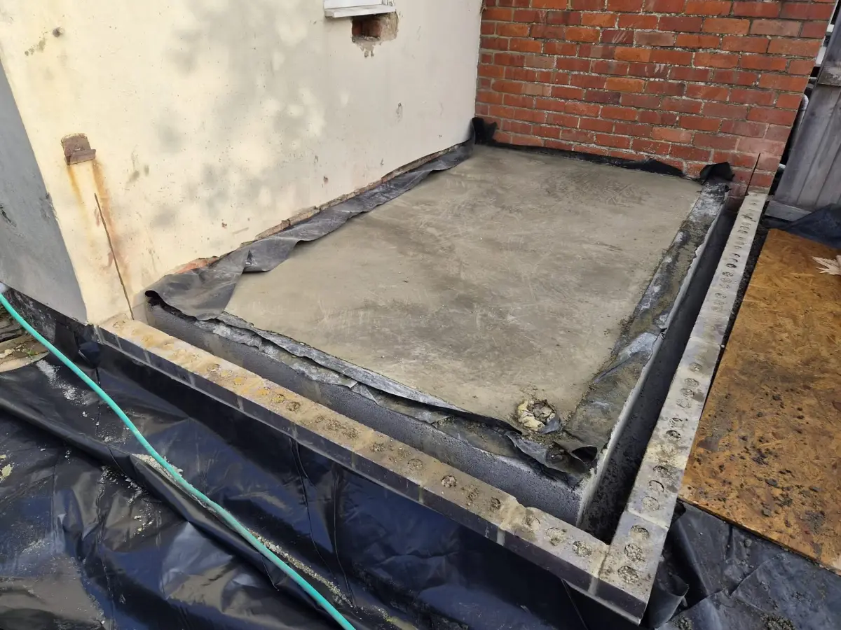 Oversite concrete slab poured for a rear extension in Broadgreen, Swindon