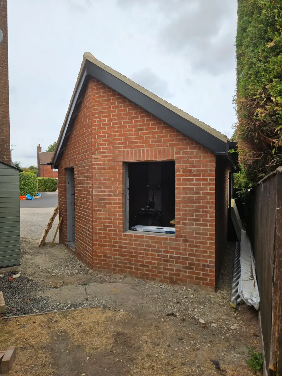 New detached brick garden building in Chiseldon with the shell complete