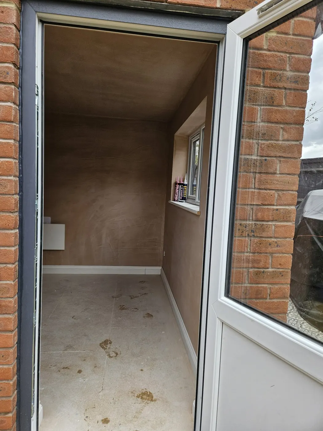 View through the open door into the finished garden room