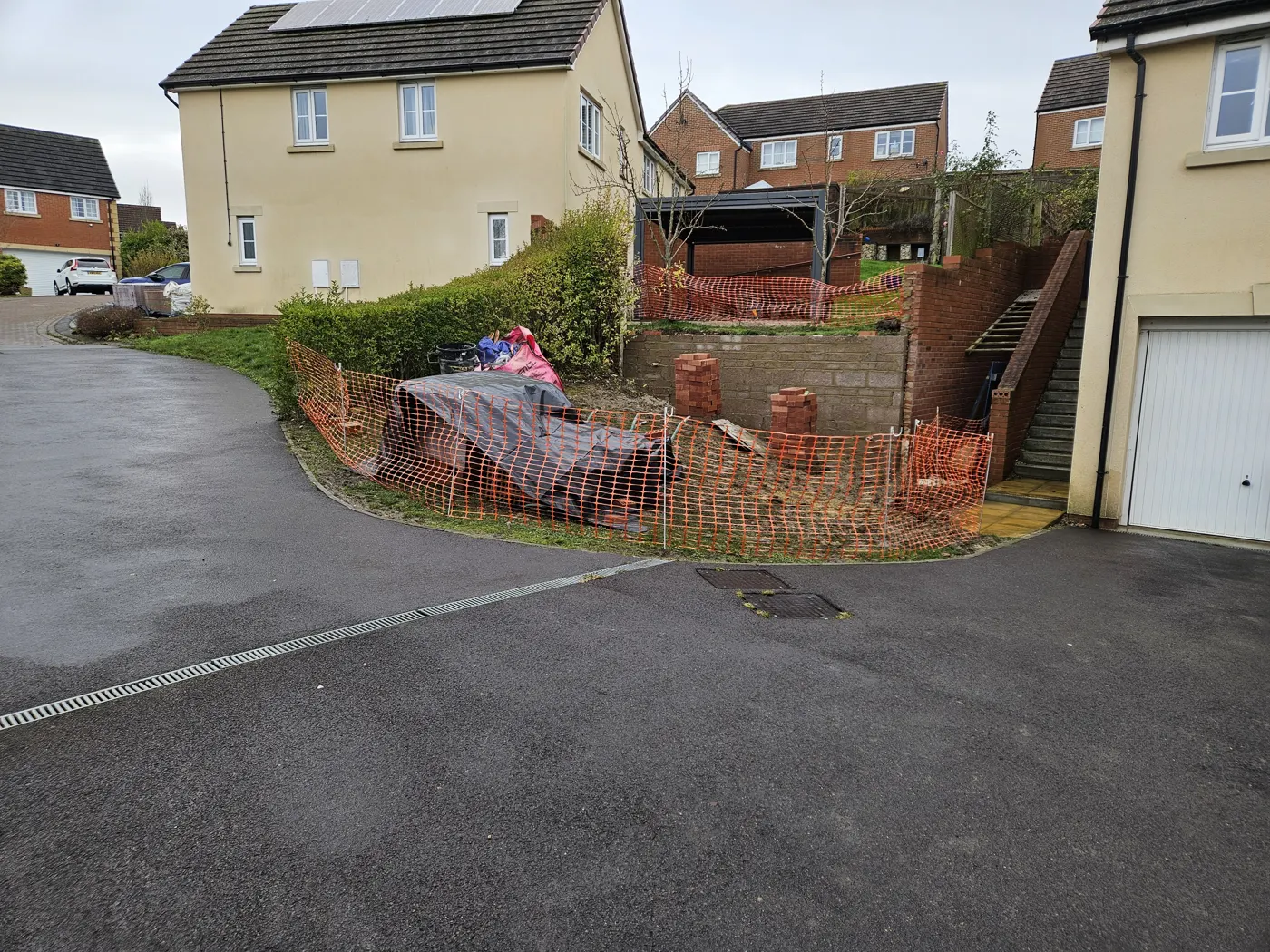 Site fenced off with the old wall removed
