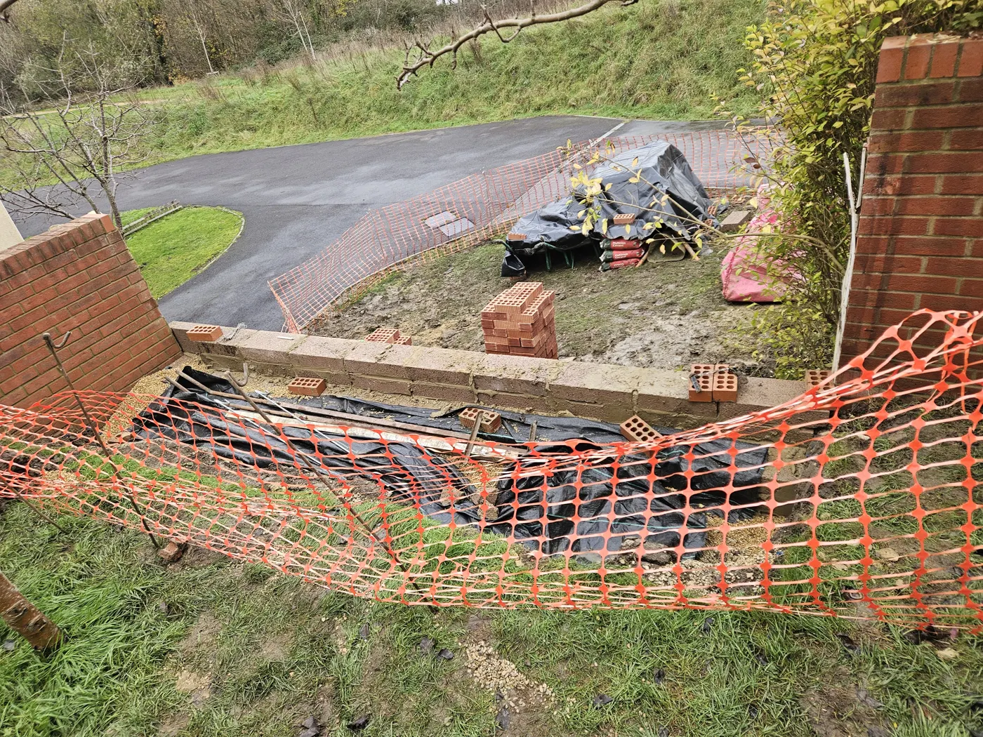 New concrete footing trench for the rebuilt wall