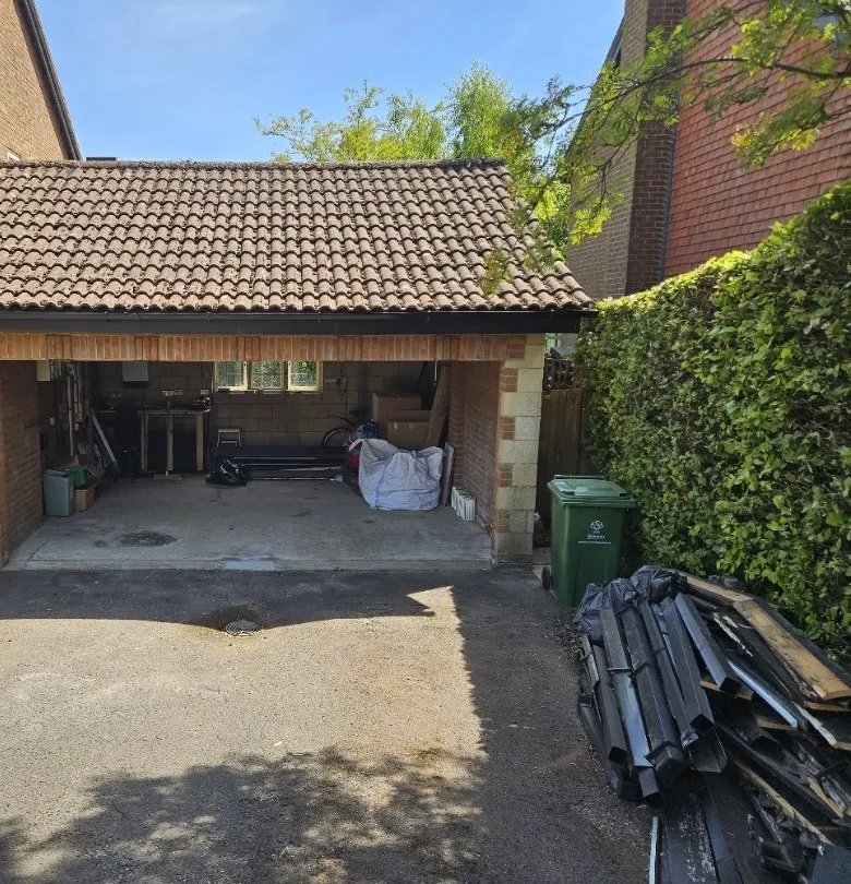 Integral garage with up-and-over door before conversion
