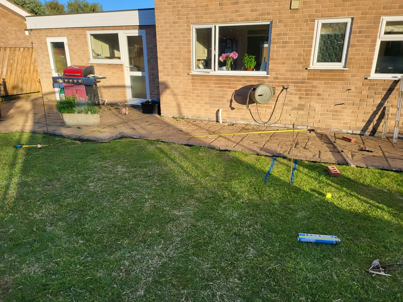 Rear elevation with setting-out lines and profiles for the new footings