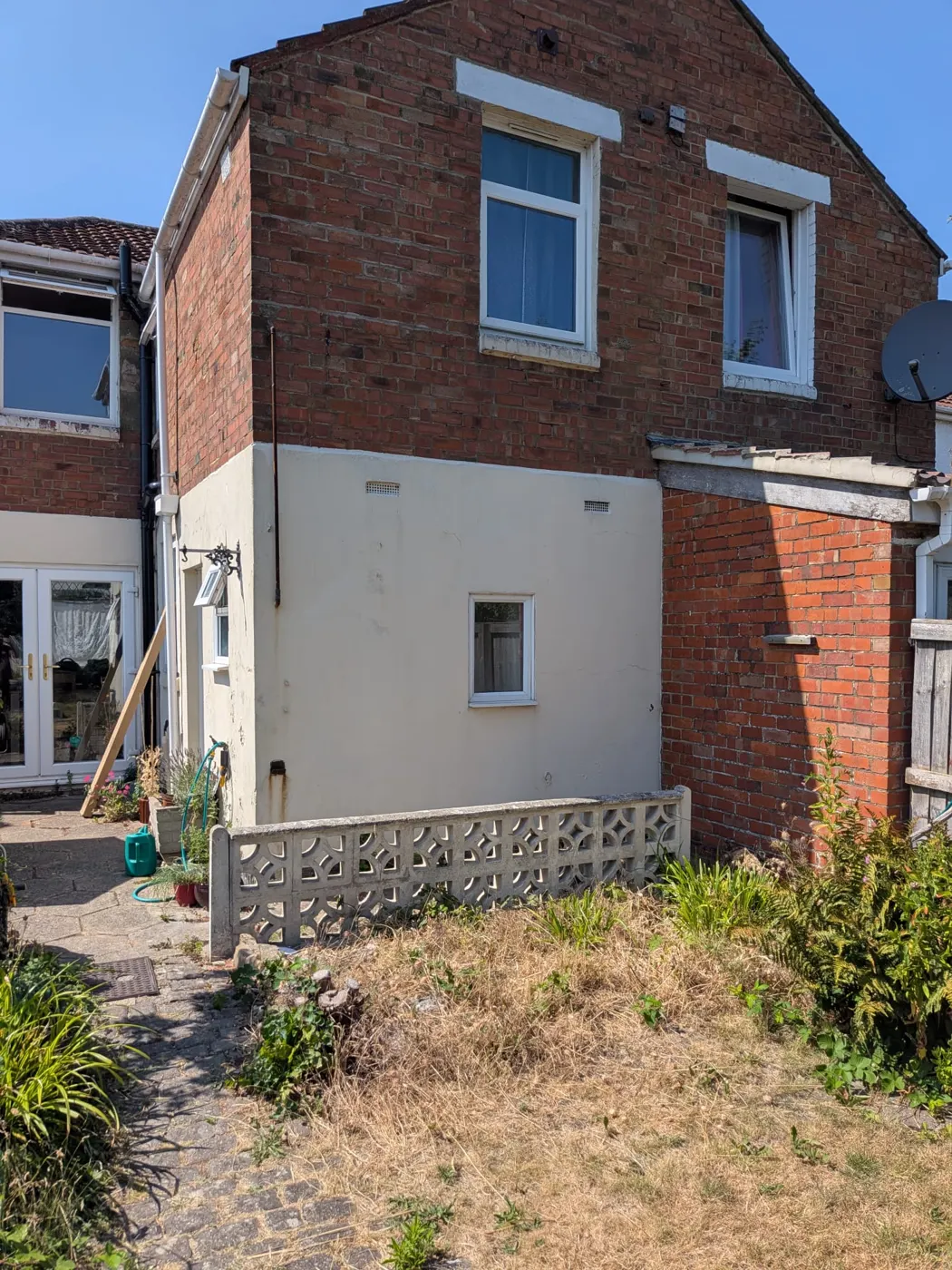 Rear garden and outrigger of the Broadgreen house before building work