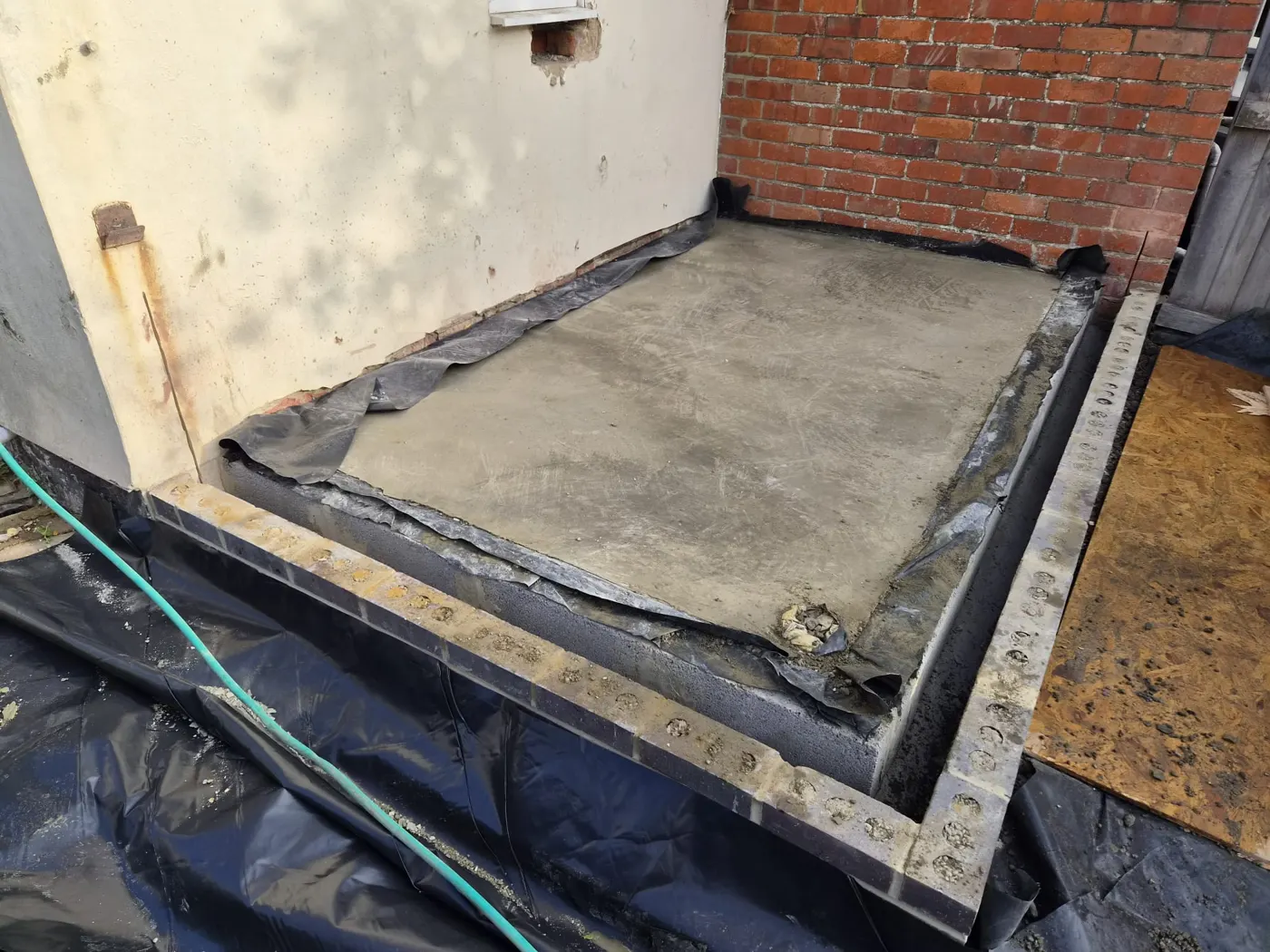 Oversite concrete slab poured within the new footings