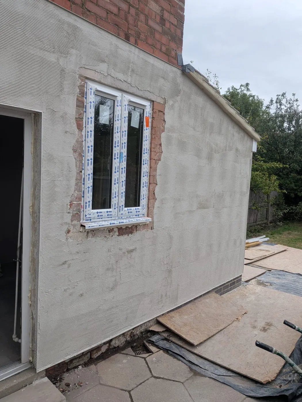 Rendered side elevation of the new extension with a new window