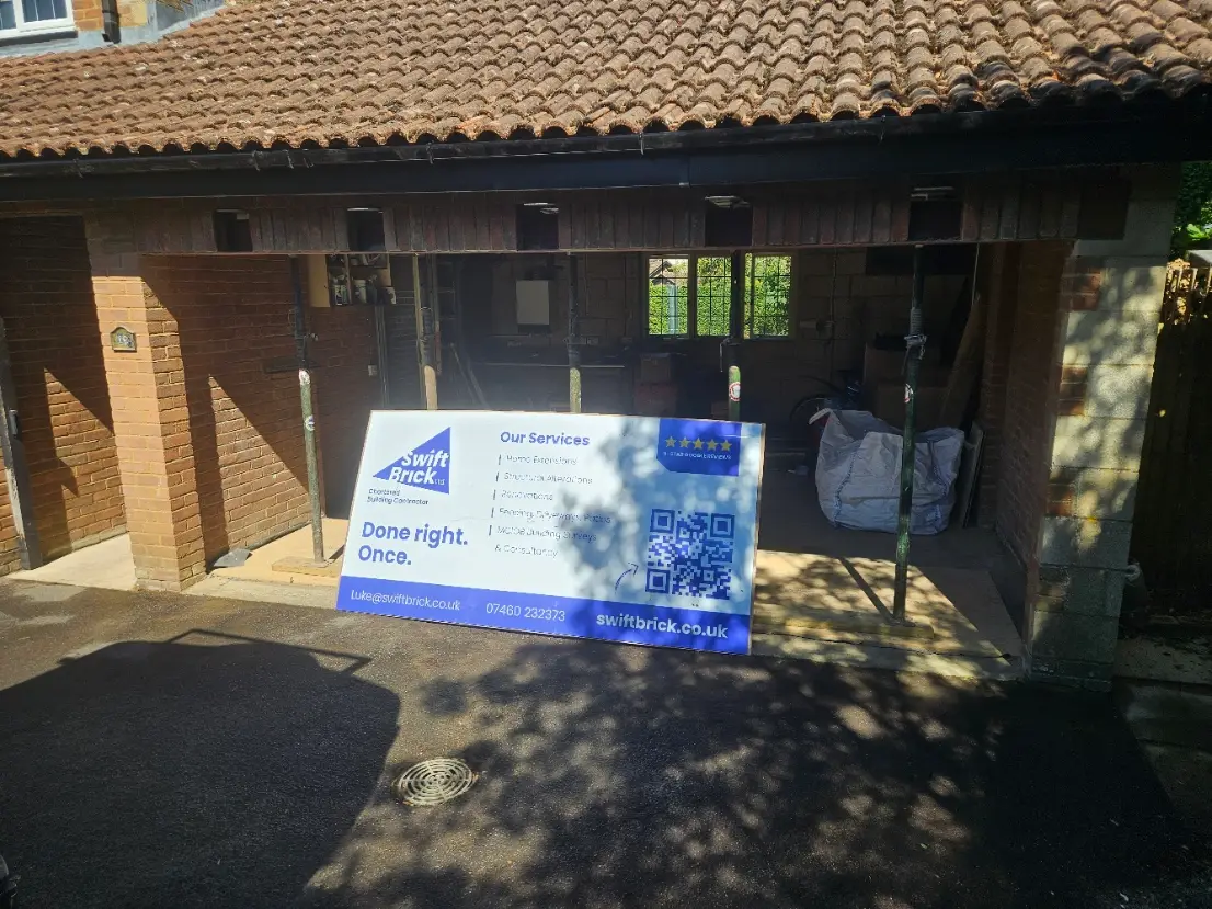 SwiftBrick site board outside a Swindon garage conversion