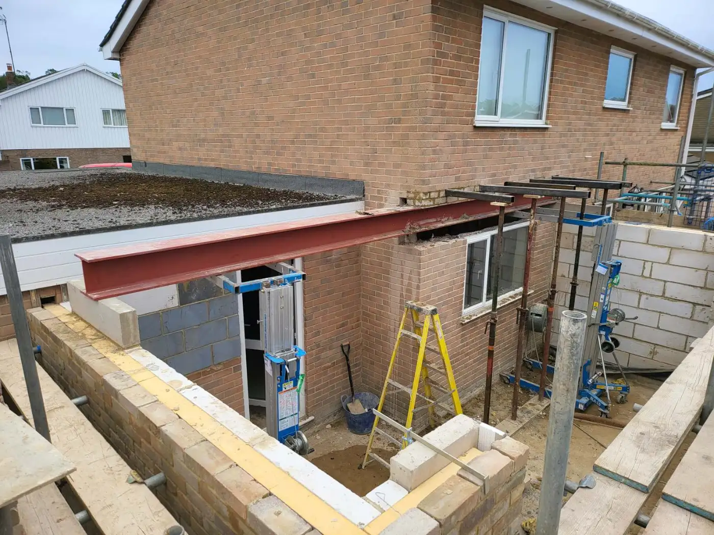 Steel beam being installed for a structural wall removal in Swindon
